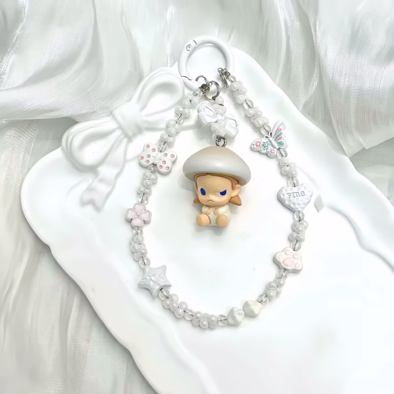 This affordable, yet adorable pastel Molly or Dimoo figure wearable art toy collectible charm is perfect for those who appreciate Kawaii culture - Image 4