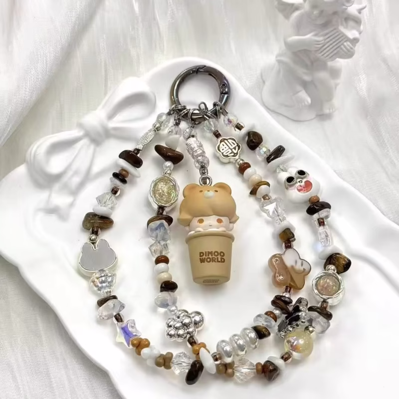 Featuring lovable, instant-favorite, and easy to collect characters, the Skullpanda Fuse Skullpanda DIY Kubo Dimoo Pucky Beans Keychain