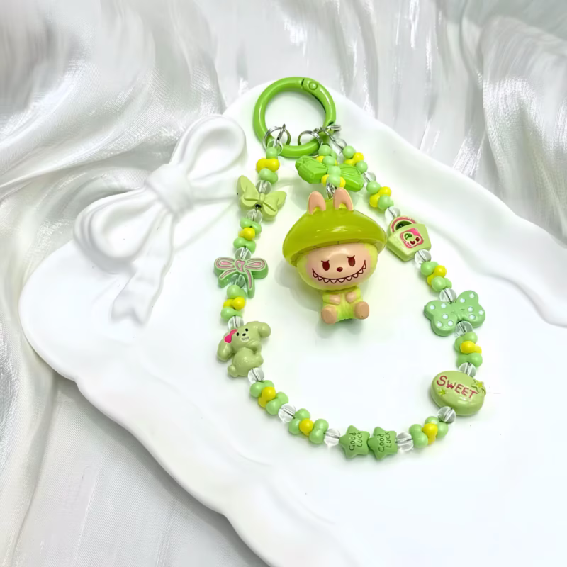 This affordable, yet adorable pastel Molly or Dimoo figure wearable art toy collectible charm is perfect for those who appreciate Kawaii culture - Image 3