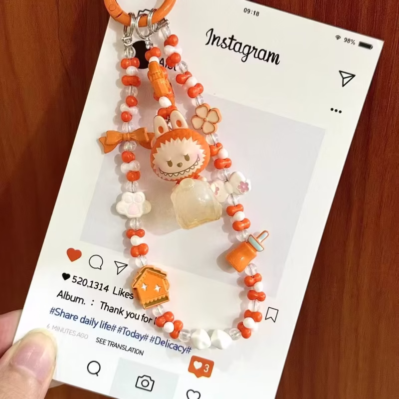 The Koi Fish Dimoo Small Skull Panda Beans is an inspired piece in the line of Dimoo Small Skull Panda Beans, and serves as a creative DIY charm that brings a handmade touch to one’s charm collection